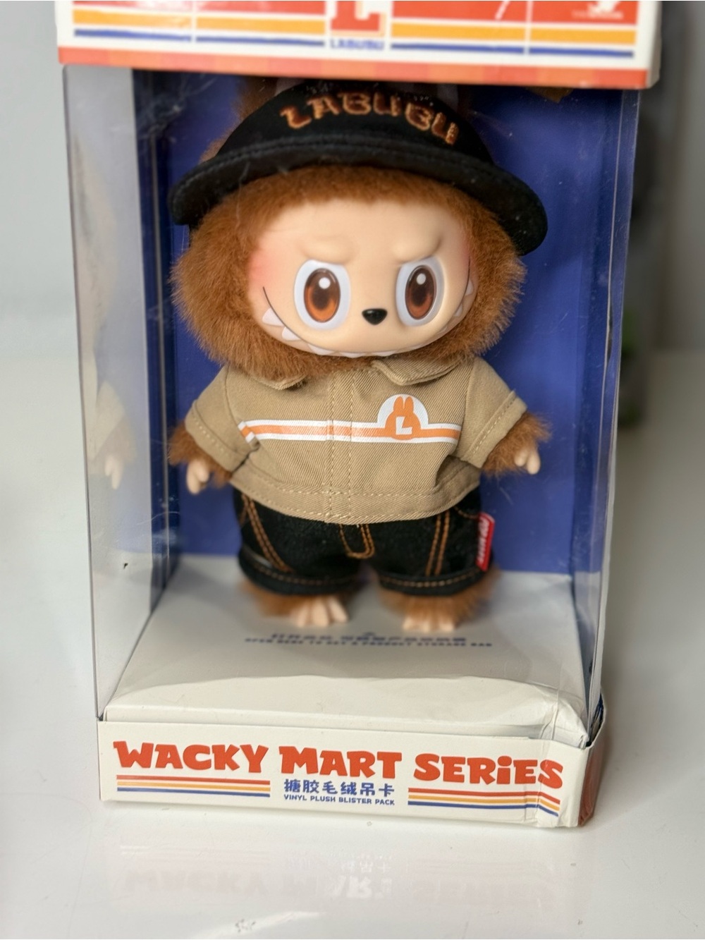Labubu Wacky Mart Series Plush Character in Tan Hoodie & Black Cap